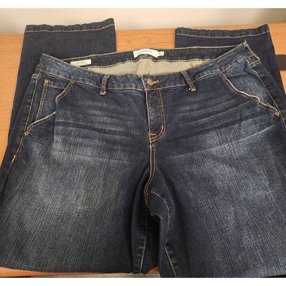 Torrid 24 slimming boot blue denim jeans. Measures approx 46 waist x 31 inseam x